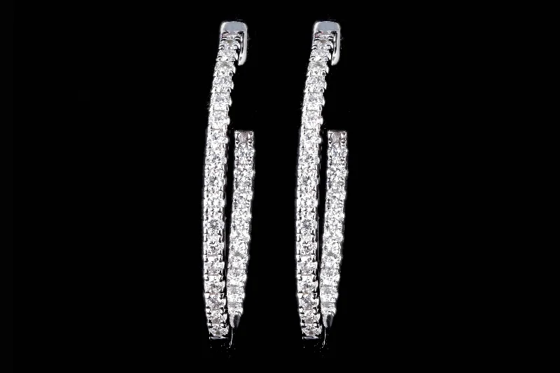 18K White Gold .80 Carat Total Weight Diamond Inside Out Oval Hoop Earrings