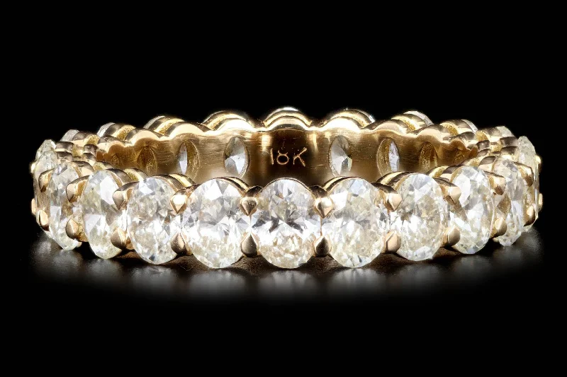 18K Yellow Gold 3.20 Carat Total Weight Oval Cut Diamond Eternity Band